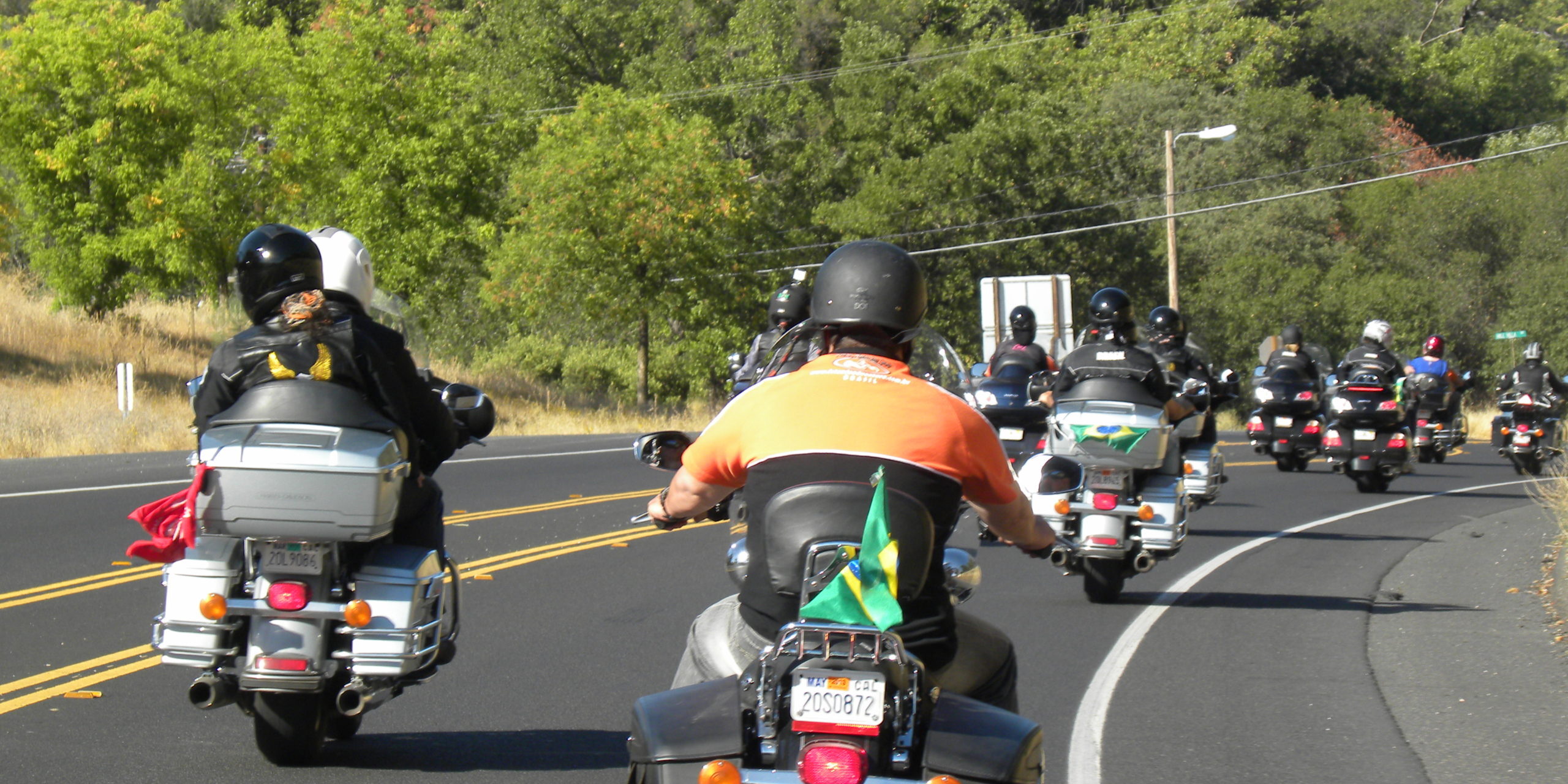 Experiência para viagem internacional de moto Motociclistas experientes em uma viagem internacional de moto em grupo